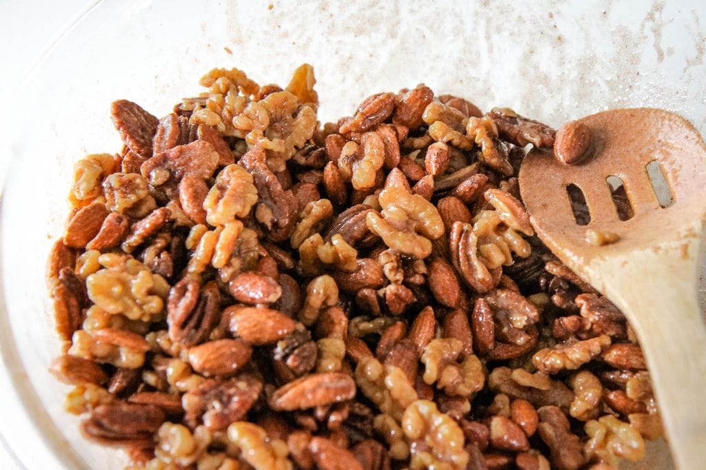 Tossing Sugar & Spice Candied Nuts With Egg Whites